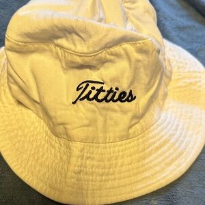 Spencer’s “Titties” titleist font bucket hat